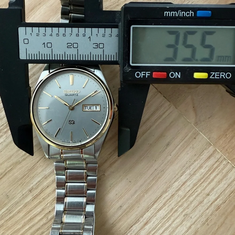 Seiko SQ Vintage Men’s Watch Gray Dial Two-Tone Bracelet Case Date Window